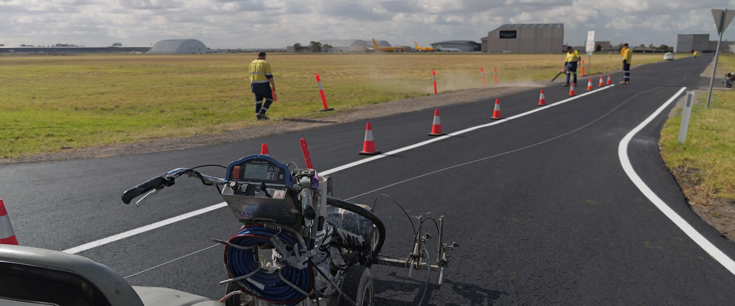 Completed maintenance road at Melbourne Airport with RAAF aircraft in background